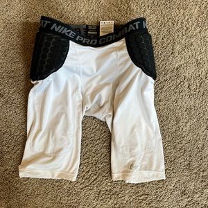 White Nike padded compression shorts
